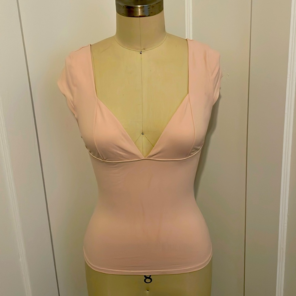 free people, M baby pink top
fits like a small
